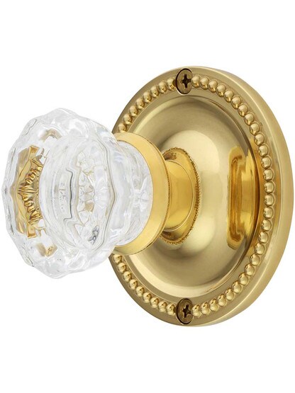 Large Beaded Rosette Door Set with Fluted Glass Knobs in Lacquered Brass.